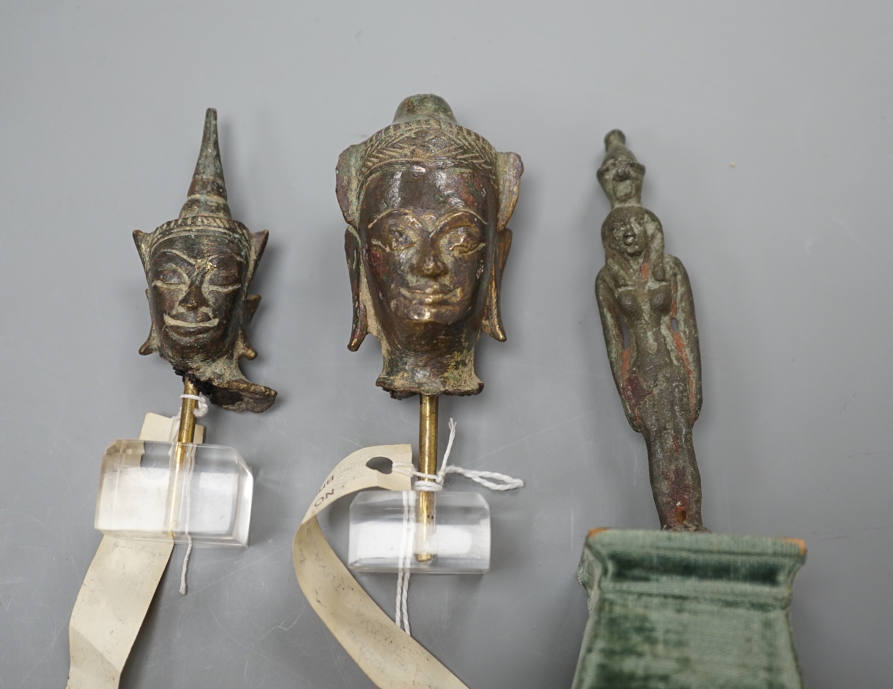 Two Thai buddha heads, Ayutthaya period and another, tallest 14 cms.